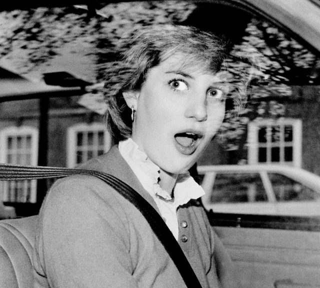 Lady Diana Spencer is startled after stalling her new red Mini Metro outside her Earls Court flat in London just days before her engagement to Prince Charles was announced (November 1980).