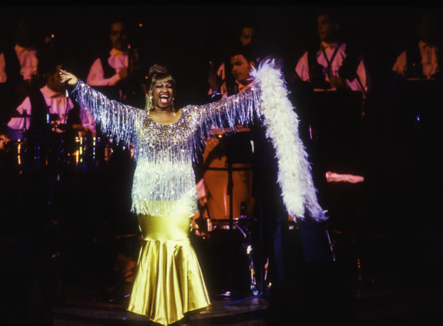 Celia Cruz performs at the JVC Jazz Festival in a bright spangled dress