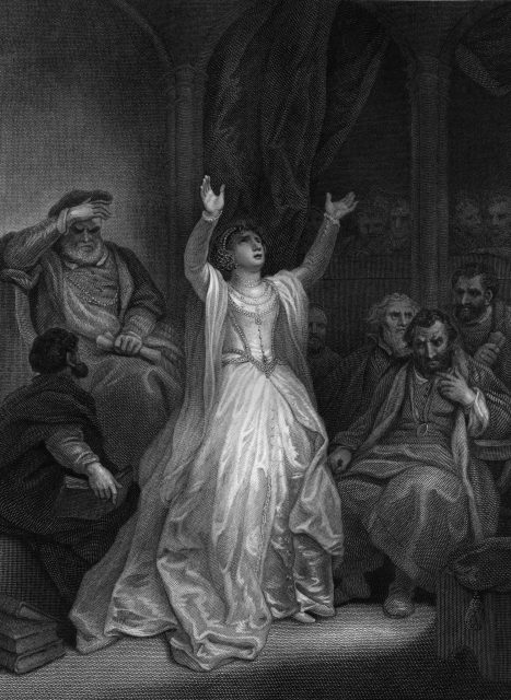 Anne Boleyn raises her arms in despair on being sentenced to death for high treason at the Tower of London.