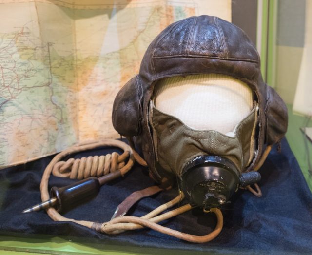 Roald Dahl's leather flying helmet which is equipped with communication cables and oxygen mask.