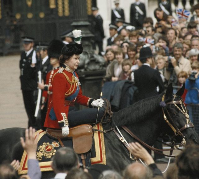 Queen Elizabeth II sitting side saddle during the Trooping the Colour ceremony on Horse Guards Parade, London, England, Great Britain, 13 June 1981.