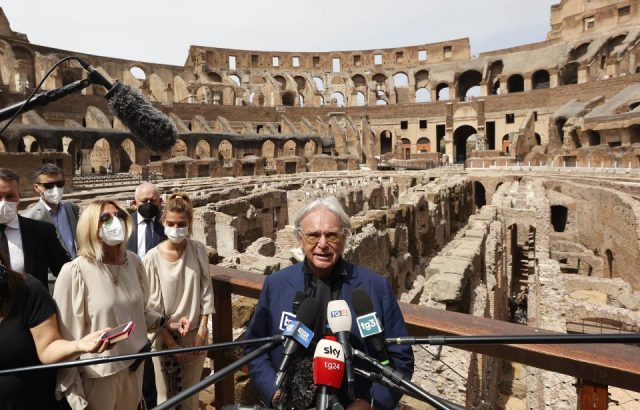 od's luxury shoe company chairman Diego Della Valle (R) talks to reporters ahead of a press conference at the Colosseum to present the end of the second stage of the monument's restorations funded by Tod's group, regarding the Hypogea area, in Rome, Italy, on June 25, 2021