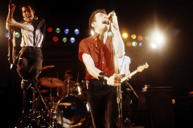 The Clash performs in concert