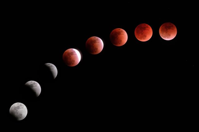This composite image created on January 31, 2018 shows the moon during a lunar eclipse referred to as the "super blue blood moon" in Tokyo. 