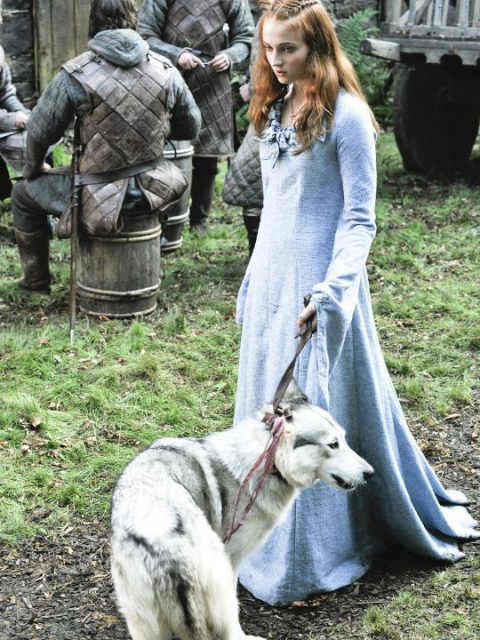 Sophie Turner with the dog that plays her dire wolf, Lady