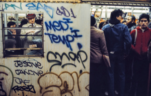 People standing in a New York City subway train