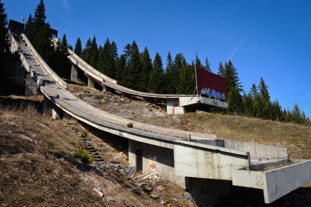 Ski ramp overrun with vegetation and plant life