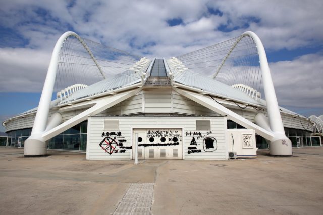 Graffiti painted onto the front of the Athens Olympic Velodrome