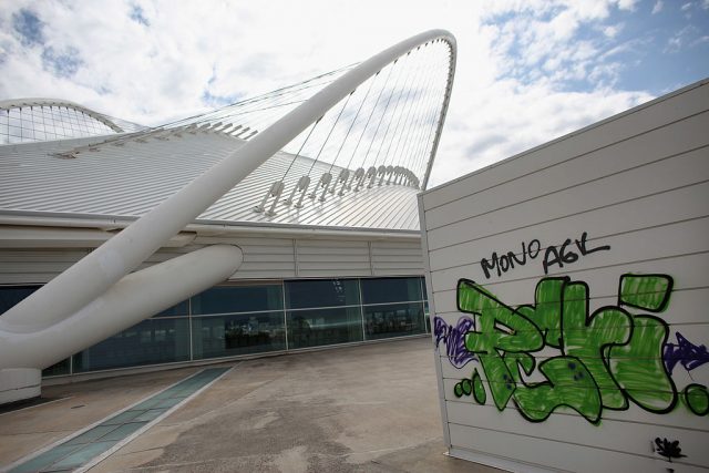 Graffiti on a wall in front of the Athens Olympic Velodrome