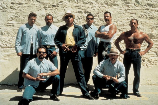 Danny Trejo, far right, poses for a promo shot in Blood In, Blood Out.