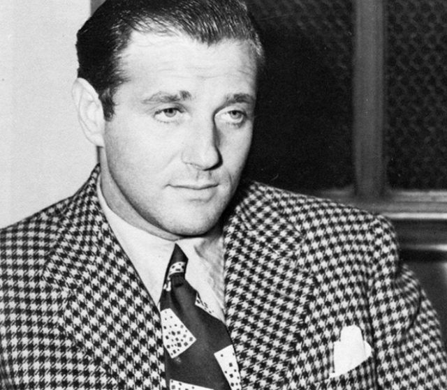 Mobster Bugsy Siegel wearing a suit and tie