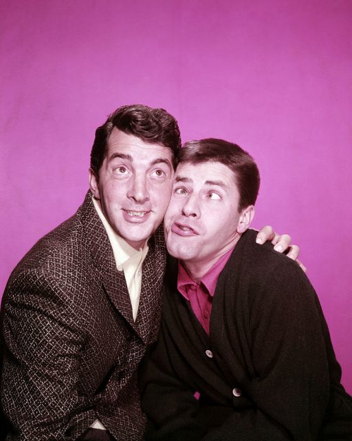 Dean Martin looking up while Jerry Lewis makes a funny face