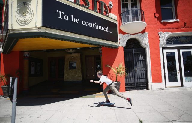 Person outside Vista Theatre