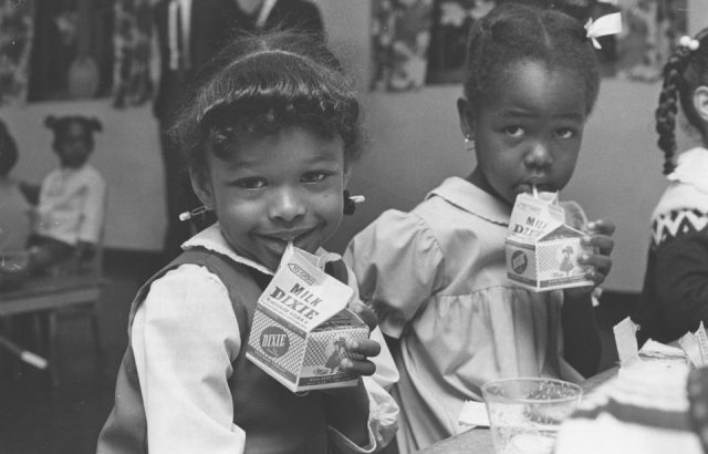 Some of the first pre-school children to be fed under the new USDA child nutrition programme in the United States, drinking milk.