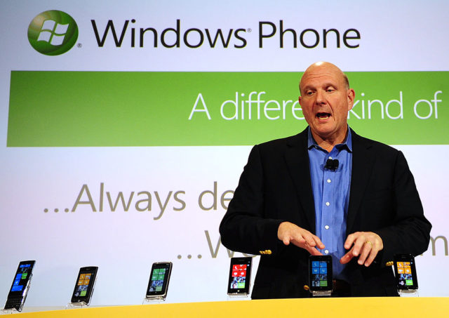 Steve Ballmer displays cell phones