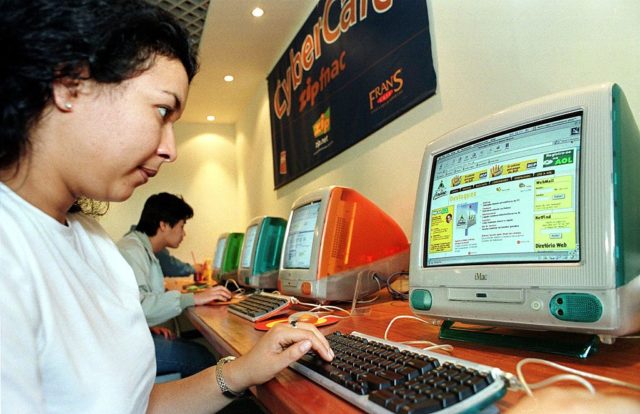 a woman at an internet cafe