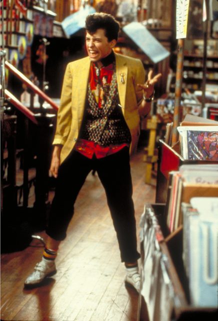 Jon Cryer standing in a record store