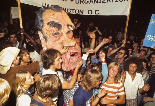 A crowd celebrating Richard Nixon's resignation