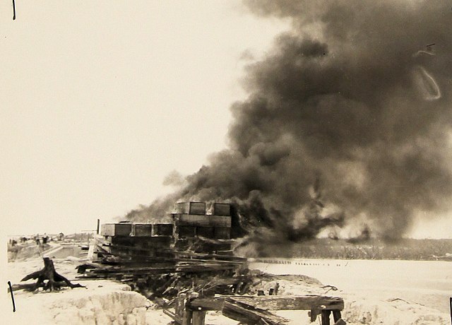 Smoke filling the air above a beach