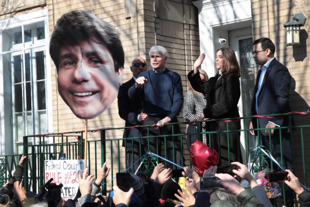 With his wife Patti by his side, former Illinois Governor Rod Blagojevich greets people gathered in front of his home as he steps out to address the press on February 19, 2020 in Chicago, Illinois (Photo Credit: Scott Olson/Getty Images)