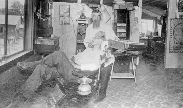 Dentist working on patient in Jacksonville Oregon, early 1890s. (Photo Credit: Mark Jay Goebel/Getty Images)