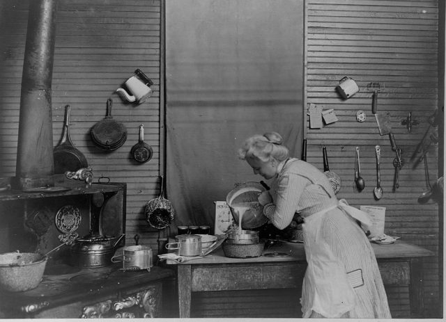 Woman pouring cake batter into a bowl