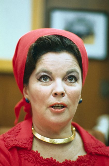 Shirley Temple dressed in a red outfit