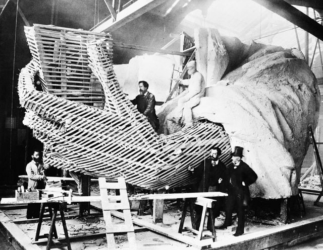 Men constructing the Statue of Liberty