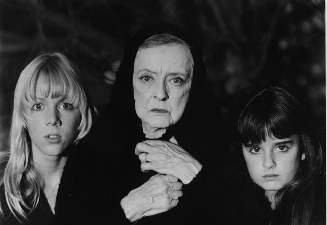 Lynn-Holly Johnson, Bette Davis and Kyle Richards look scared in a scene for the Walt Disney movie “The Watcher in the Woods” circa 1979. (Photo Credit Hulton Archive/Getty Images)