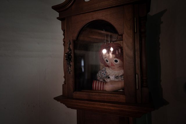 Annabelle doll locked in a cabinet