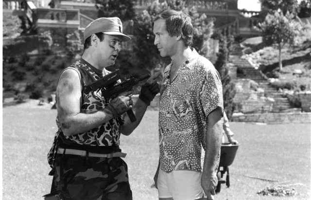 Actor Dan Aykroyd and Chevy Chase on set of the movie Caddyshack II (Photo Credit: Michael Ochs Archives/Getty Images)
