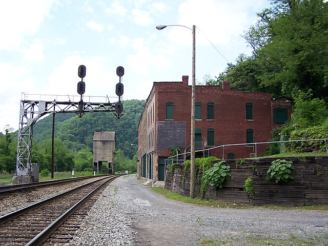 CSX railroad running alongside a brick building