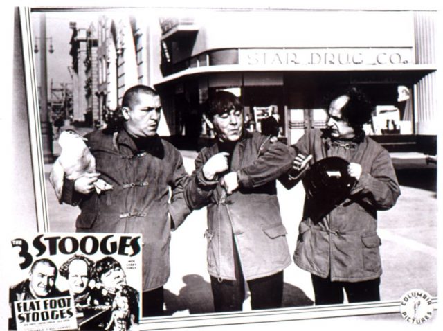 Flat Foot Stooges, lobbycard, Curly Howard, Moe Howard, Larry Fine (The Three Stooges), 1938. (Photo Credit: LMPC via Getty Images)