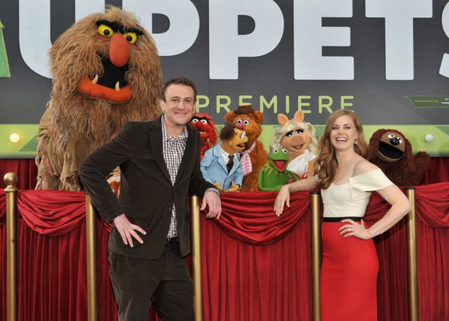 Jason Segel and Amy Adams arrive at the premiere of Walt Disney Pictures’ “The Muppets” (Photo Credit: Mark Davis/Getty Images)