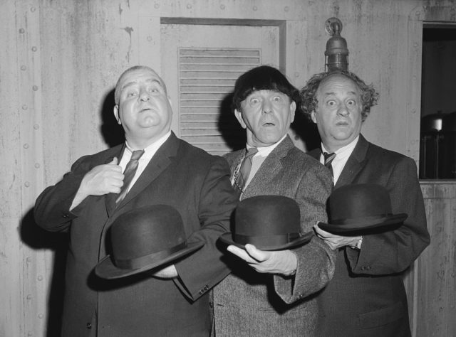 the Stooges holding hats