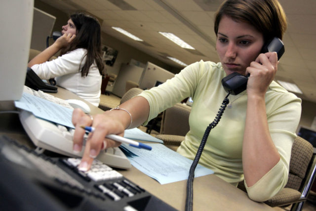 a young woman making phone calls