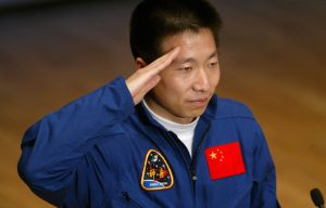 astronaut saluting the flag