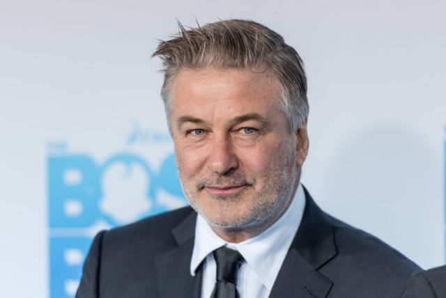 Alec Baldwin posing on a red carpet