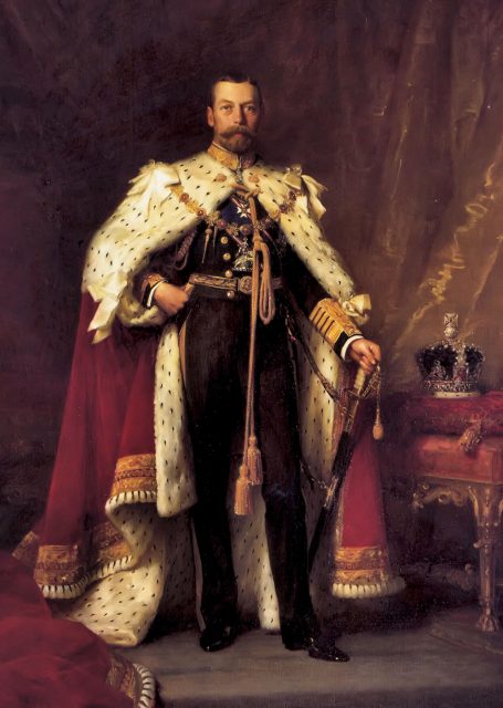 George V in coronation robes (Photo Credit: By Luke Fildes – Royal Collection, Public Domain, via Wikimedia Commons)