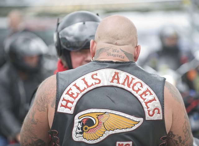 Hells Angels check visitors to the Bulldog Bash at Shakespeare County Raceway on August 12, 2010 in Stratford-upon-Avon, England. (Photo Credit: Steve Thorne/Redferns)