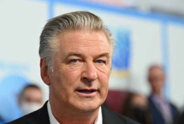 Alec Baldwin posing on a red carpet