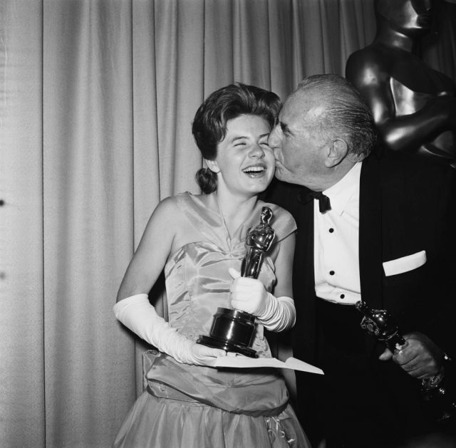 Patty Duke and Ed Begley (1901-1970) in the 35th Academy Awards press room, at the Santa Monica Civic Auditorium in Santa Monica, California, 8th April 1963.  (Photo Credit: Archive Photos/Hulton Archive/Getty Images)