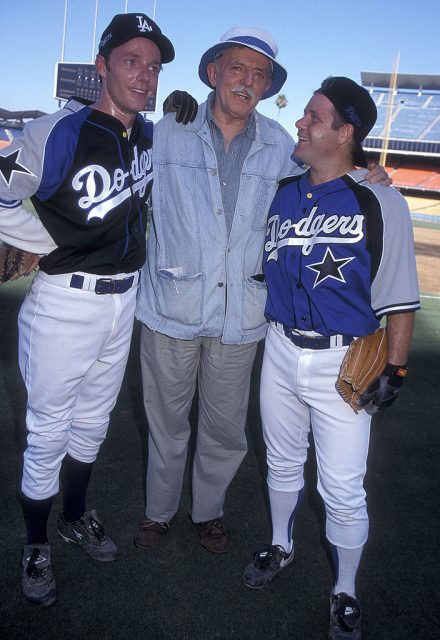 Actor John Astin and sons Mackenzie Astin and Sean Astin attend the 40th Annual “Hollywood Stars Night” Celebrity Baseball Game on August 8, 1998 at Dodger Stadium in Los Angeles, California. (Photo Credit: Ron Galella, Ltd./Ron Galella Collection via Getty Images)