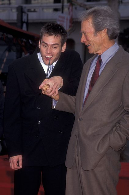 Actors Jim Carrey and Clint Eastwood attend Jim Carrey Hand and Footprints Ceremony on November 2, 1995 at Mann Chinese Theater in Hollywood, California. (Photo Credit: Ron Galella, Ltd./Ron Galella Collection via Getty Images)