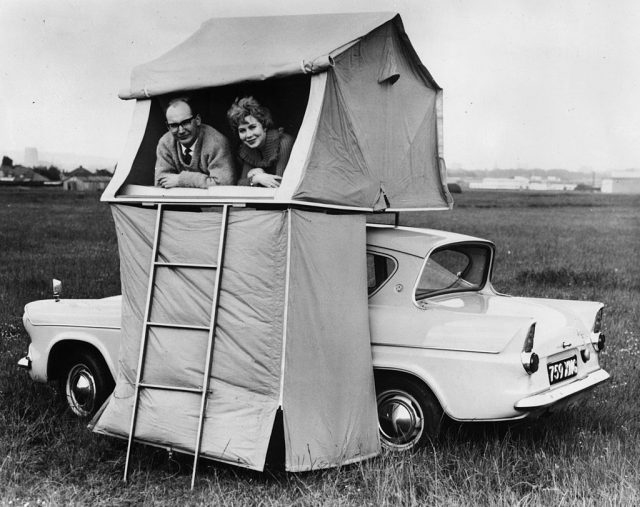 20th September 1961: A ‘Trotent’ which will be on show at the International Caravan Exhibition at Earl’s Court, London. Supported by the roof of a car, the tent sleeps two and there is a ‘ground floor’ apartment for dressing or use as a loggia. (Photo Credit: Keystone/Getty Images)