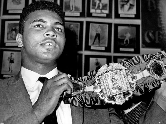 Mohammed Ali Shows The Heavyweight Belt. 1964. (Photo Credit: EyeOn/Universal Images Group via Getty Images)