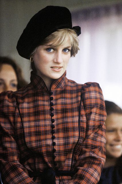 Diana, Princess of Wales, wearing a tartan dress designed by Caroline Charles and a black Tam o’ shanter style hat, attends the Braemar Highland Games on September 05, 1981 in Braemar, Scotland. (Photo Credit: Anwar Hussein/WireImage)