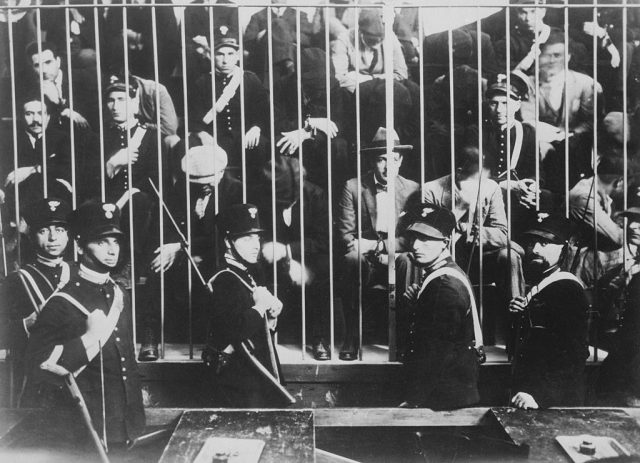 Police guarding members of the Sicilian Mafia in jail