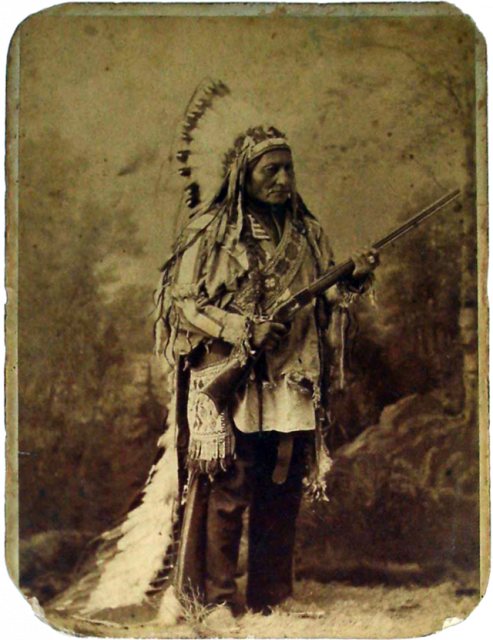 Sitting Bull holding a Winchester rifle