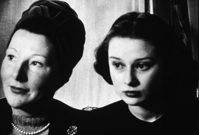 Baroness Ella van Heemstra standing beside Audrey Hepburn